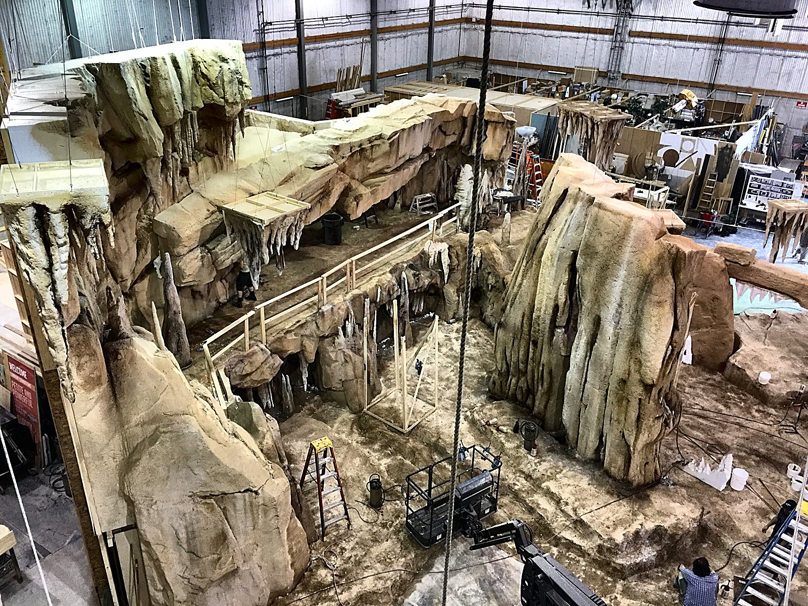 Overhead view of a hand-built stone cave room