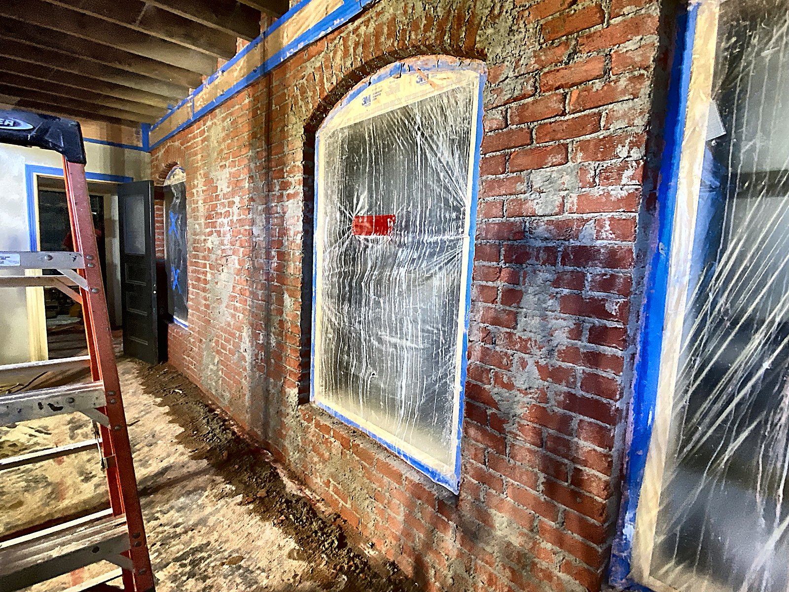 Brick wall restoration in progress