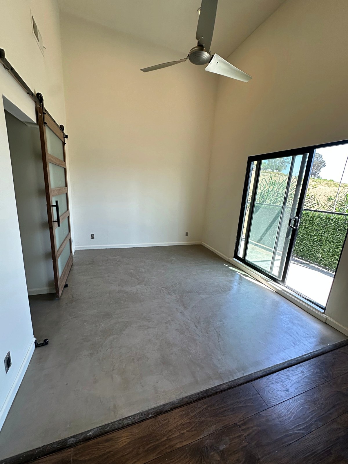 Bedroom with sealed polished concrete floor