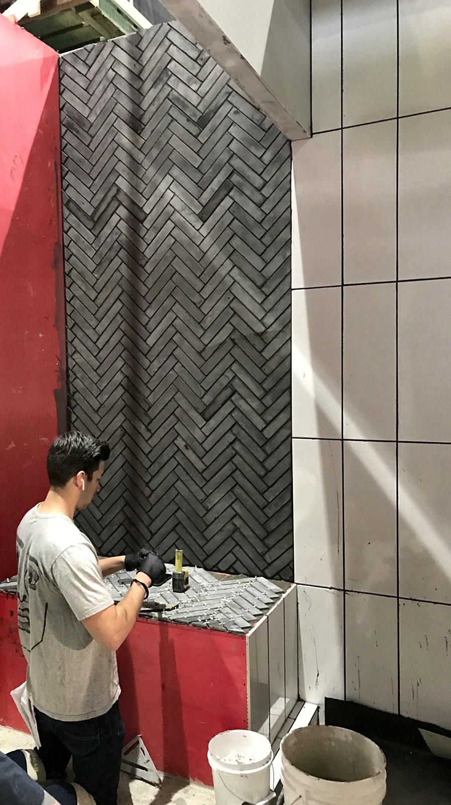 Herringbone patterned brick wall